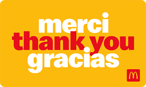 Physical gift card with thank you written in French, English and Spanish and the McDonald’s Arch icon in the bottom right corner